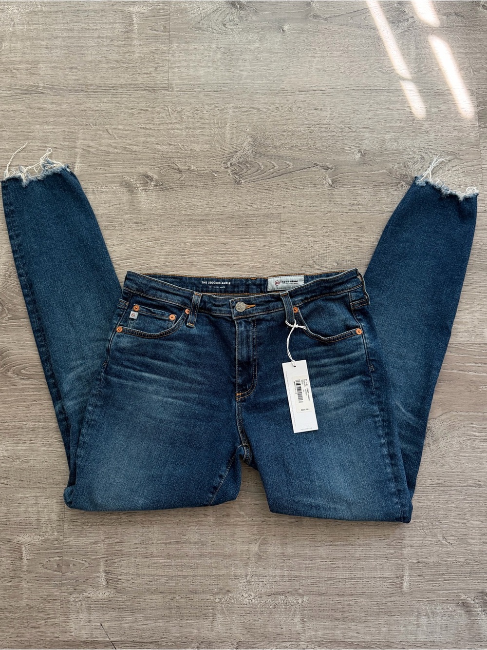 AG Adriano Goldschmied Dark Blue Skinny Jeans with Frayed Ankles